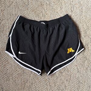 Nike Black Women's Athletic Shorts with White Trim and Gold “M” Logo